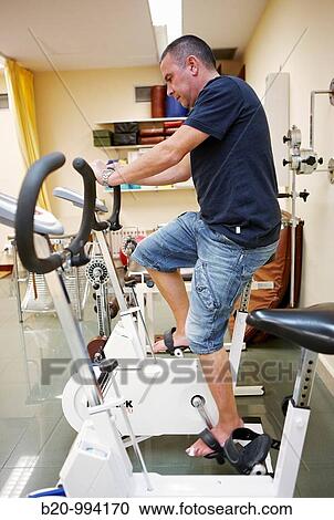 Exercise bike, increasing force production and flexibility, rebahilitation. Policlinica Gipuzkoa, San Sebastian, Donostia, Euskadi, Spain View Large Photo Image Stock Image - Exercise bike, increasing force production and flexibility, rebahilitation. Policlinica Gipuzkoa, San Sebastian, Donostia, Euskadi, Spain. Fotosearch