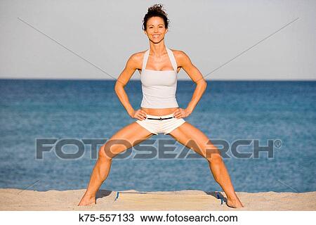 Exercise, caucasian-hispanic, age 30 to 40, on the beach. View Large Photo Image Stock Image - Exercise, caucasian-hispanic, age 30 to 40, on the beach.. Fotosearch