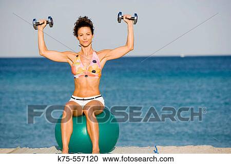 Exercise, health, caucasian, hispanic, weights, exercise ball, beach, ocean, age 30 to 40. View Large Photo Image Stock Image - Exercise, health, caucasian, hispanic, weights, exercise ball, beach, ocean, age 30 to 40.. Fotosearch