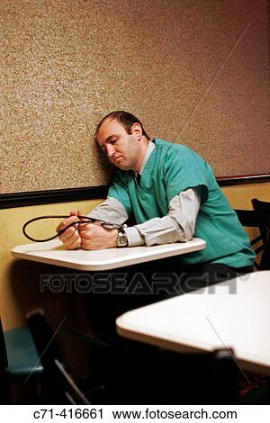 Exhausted surgeon View Large Photo Image Stock Image - Exhausted surgeon. Fotosearch