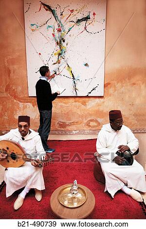 Exhibit of painter Francesca Brenda at the Caf? Litt? raire Dar Cherifa, in the Medina of Marrakech. Morocco. View Large Photo Image Stock Photo - Exhibit of painter Francesca Brenda at the Caf? Litt? raire Dar Cherifa, in the Medina of Marrakech. Morocco.. Fotosearch