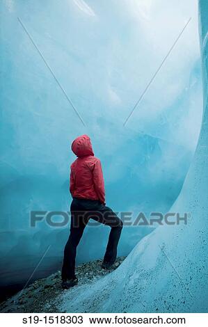 Exploring the Ice Cavea View Large Photo Image Stock Image - Exploring the Ice Cavea. Fotosearch