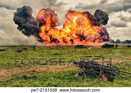 Stock Photo - Explosion following aircraft bombing during Battle of Lomianki - historical reenactment, Poland.. Fotosearch