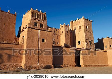 Exterior of the mud brick Kasbah of Taourirt, Ouarzazate, Morocco, built by Pasha Glaoui. A Unesco World Heritage Site. View Large Photo Image Stock Image - Exterior of the mud brick Kasbah of Taourirt, Ouarzazate, Morocco, built by Pasha Glaoui. A Unesco World Heritage Site.. Fotosearch