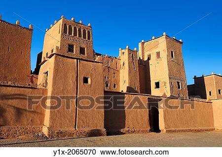 Exterior of the mud brick Kasbah of Taourirt, Ouarzazate, Morocco, built by Pasha Glaoui. A Unesco World Heritage Site. View Large Photo Image Stock Image - Exterior of the mud brick Kasbah of Taourirt, Ouarzazate, Morocco, built by Pasha Glaoui. A Unesco World Heritage Site.. Fotosearch