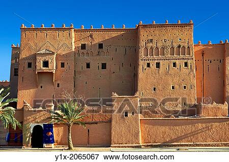 Exterior of the mud brick Kasbah of Taourirt, Ouarzazate, Morocco, built by Pasha Glaoui. A Unesco World Heritage Site. View Large Photo Image Stock Photo - Exterior of the mud brick Kasbah of Taourirt, Ouarzazate, Morocco, built by Pasha Glaoui. A Unesco World Heritage Site.. Fotosearch