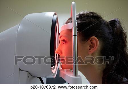 Eye examination Patient having a corneal topography measurement made of her eye View Large Photo Image Stock Image - Eye examination Patient having a corneal topography measurement made of her eye. Fotosearch