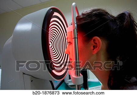 Eye examination Patient having a corneal topography measurement made of her eye View Large Photo Image Stock Image - Eye examination Patient having a corneal topography measurement made of her eye. Fotosearch