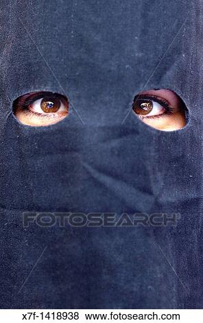 Eyes of a peniente Holy Week procession `La Sed? Holy Wednesday Seville Spain View Large Photo Image Stock Photo - Eyes of a peniente Holy Week procession `La Sed? Holy Wednesday Seville Spain. Fotosearch