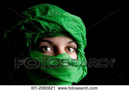 Eyes of girl with green turban View Large Photo Image Stock Image - Eyes of girl with green turban. Fotosearch