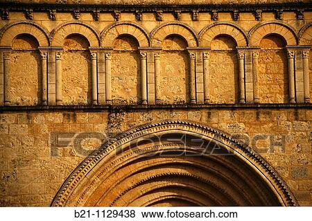 Stock Photo - Fa? ade of Romanesque church (12th century), Saint-Privat-des-Pres, Dordogne, Aquitaine, France. Fotosearch