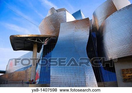 Facade of Guggenheim Museum and Tulipso sculpture by Jeff Koons, Bilbao, Vizcaya, Basque Country, Spain, Europe View Large Photo Image Stock Photo - Facade of Guggenheim Museum and Tulipso sculpture by Jeff Koons, Bilbao, Vizcaya, Basque Country, Spain, Europe. Fotosearch