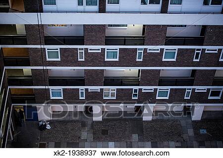 Facade of poor people flats in outskirts, viewed from above, Bermonsey, London, UK View Large Photo Image Stock Photo - Facade of poor people flats in outskirts, viewed from above, Bermonsey, London, UK. Fotosearch