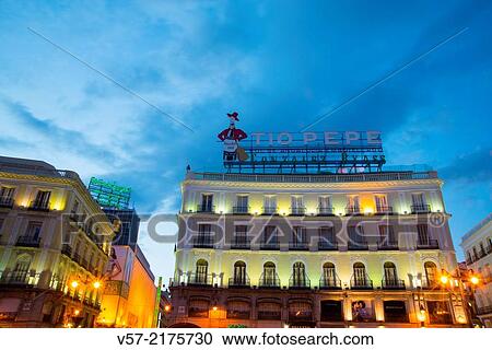 Facade with new Tio Pepe neon sign on its new location, night view. Puerta del Sol, Madrid, Spain. View Large Photo Image Stock Image - Facade with new Tio Pepe neon sign on its new location, night view. Puerta del Sol, Madrid, Spain.. Fotosearch