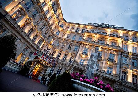 Facades at dusk of the GrandHotel Pupp in Karlovy Vary Karlovy Vary, Bohemia, Czech Republic, Europe View Large Photo Image Stock Image - Facades at dusk of the GrandHotel Pupp in Karlovy Vary Karlovy Vary, Bohemia, Czech Republic, Europe. Fotosearch