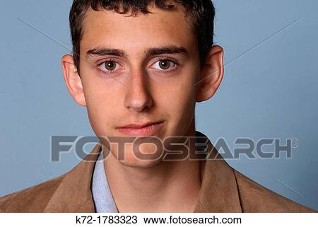 Face of a 15 year old young man with slight smile View Large Photo Image Stock Image - Face of a 15 year old young man with slight smile. Fotosearch
