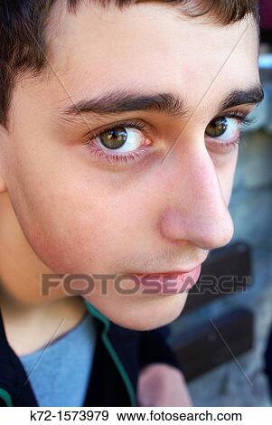 Face of a teenager thinking of the future View Large Photo Image Stock Photo - Face of a teenager thinking of the future. Fotosearch