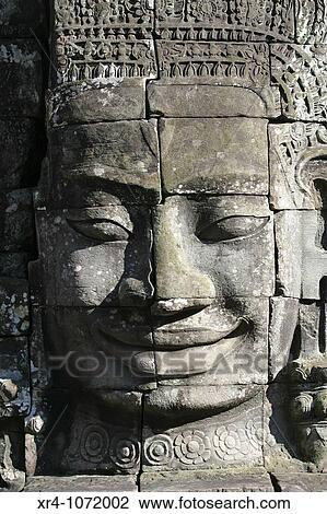 Stock Image - Faces of Bayon Temple, Angkor Wat, Siem Reap. Fotosearch