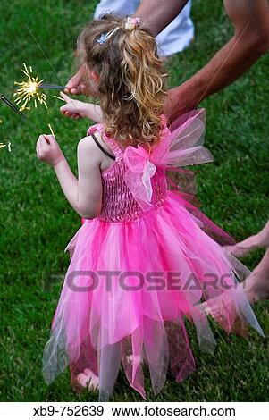 Fairy girl with sparklers View Large Photo Image Stock Photo - Fairy girl with sparklers. Fotosearch