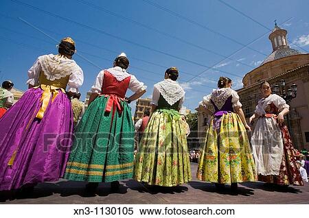 Falleras (women in traditional dress) beside the Cathedral, Valencia. Valencian Community, Spain View Large Photo Image Stock Photography - Falleras (women in traditional dress) beside the Cathedral, Valencia. Valencian Community, Spain. Fotosearch