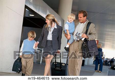 family at an airport with baggage View Large Photo Image Stock Photography - family at an airport with baggage. Fotosearch