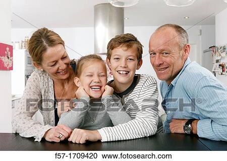 Family at home View Large Photo Image Stock Image - Family at home. Fotosearch