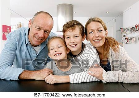 Family at home View Large Photo Image Stock Image - Family at home. Fotosearch