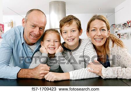 Family at home View Large Photo Image Stock Image - Family at home. Fotosearch