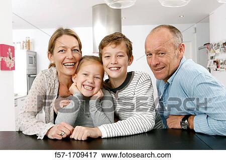 Family at home View Large Photo Image Stock Photo - Family at home. Fotosearch