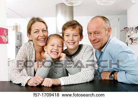 Family at home View Large Photo Image Stock Photo - Family at home. Fotosearch