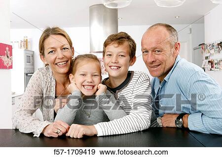 Family at home View Large Photo Image Stock Photo - Family at home. Fotosearch