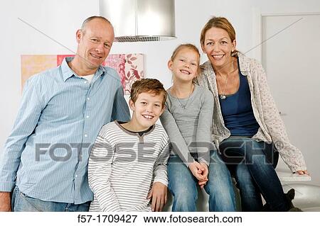 Family at home View Large Photo Image Stock Photo - Family at home. Fotosearch