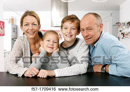 Family at home View Large Photo Image Stock Photograph - Family at home. Fotosearch
