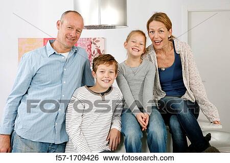 Family at home View Large Photo Image Stock Photograph - Family at home. Fotosearch