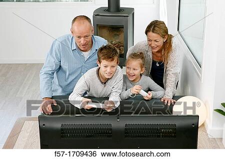 Family at home View Large Photo Image Stock Photograph - Family at home. Fotosearch