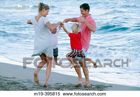 family at the beach View Large Photo Image Stock Photography - family at the beach. Fotosearch