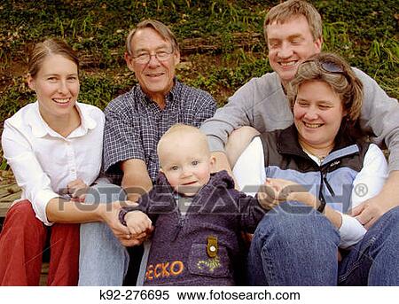 Family celebrating a baby's first birthday View Large Photo Image Stock Photography - Family celebrating a baby's first birthday. Fotosearch