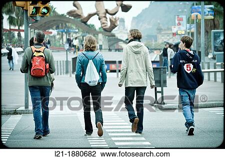 Family crossing a zebra when the light is green. Barcelona, Catalonia, Spain. View Large Photo Image Stock Image - Family crossing a zebra when the light is green. Barcelona, Catalonia, Spain.. Fotosearch