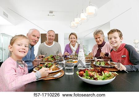 Stock Photograph - Family dinner. Fotosearch