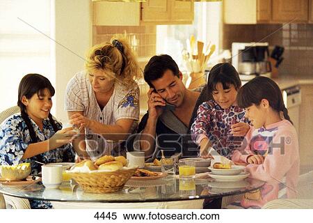 Family eating breakfast View Large Photo Image Stock Photography - Family eating breakfast. Fotosearch