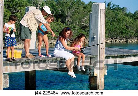 Family fishing on a dock at the beach. Florida. USA View Large Photo Image Picture - Family fishing on a dock at the beach. Florida. USA. Fotosearch