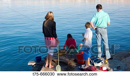 Stock Image - Family fishing. Fotosearch