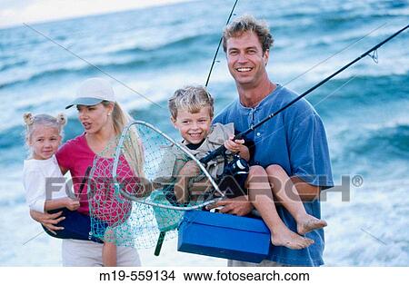 Picture - family fun at the beach. Fotosearch