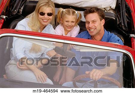 family in a convertible sport car View Large Photo Image Picture - family in a convertible sport car. Fotosearch