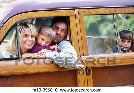 family in an old? woody? station wagon car View Large Photo Image Stock Image - family in an old? woody? station wagon car. Fotosearch