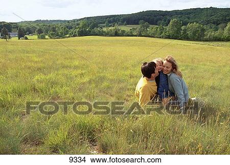Family in field View Large Photo Image Picture - Family in field. Fotosearch