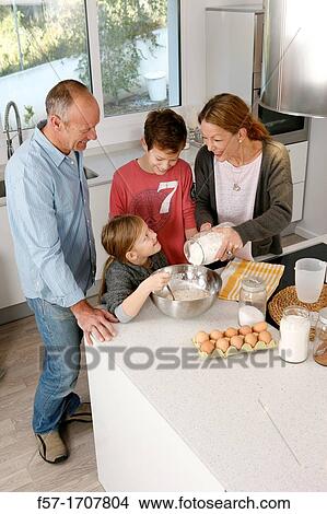 Family in the kitchen View Large Photo Image Picture - Family in the kitchen. Fotosearch