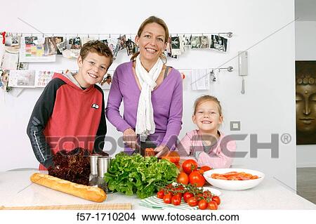 Family in the kitchen View Large Photo Image Picture - Family in the kitchen. Fotosearch