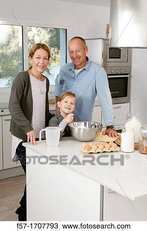 Family in the kitchen View Large Photo Image Stock Image - Family in the kitchen. Fotosearch
