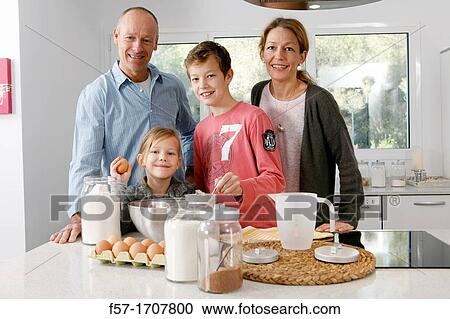Family in the kitchen View Large Photo Image Stock Image - Family in the kitchen. Fotosearch